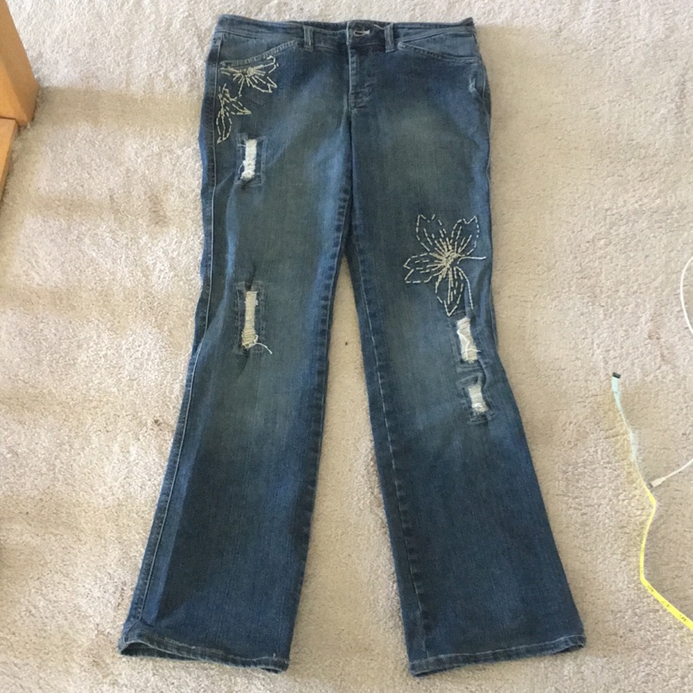 Embroidered flower distressed jeans